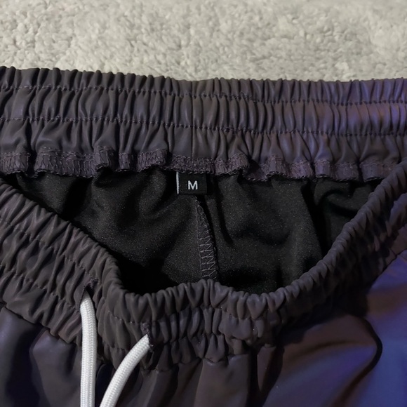 Size Medium Raskol space shorts flash reflective fabric material. Inseam 4” - Picture 7 of 7